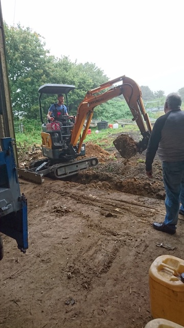  Excavating a trench for channel drains 